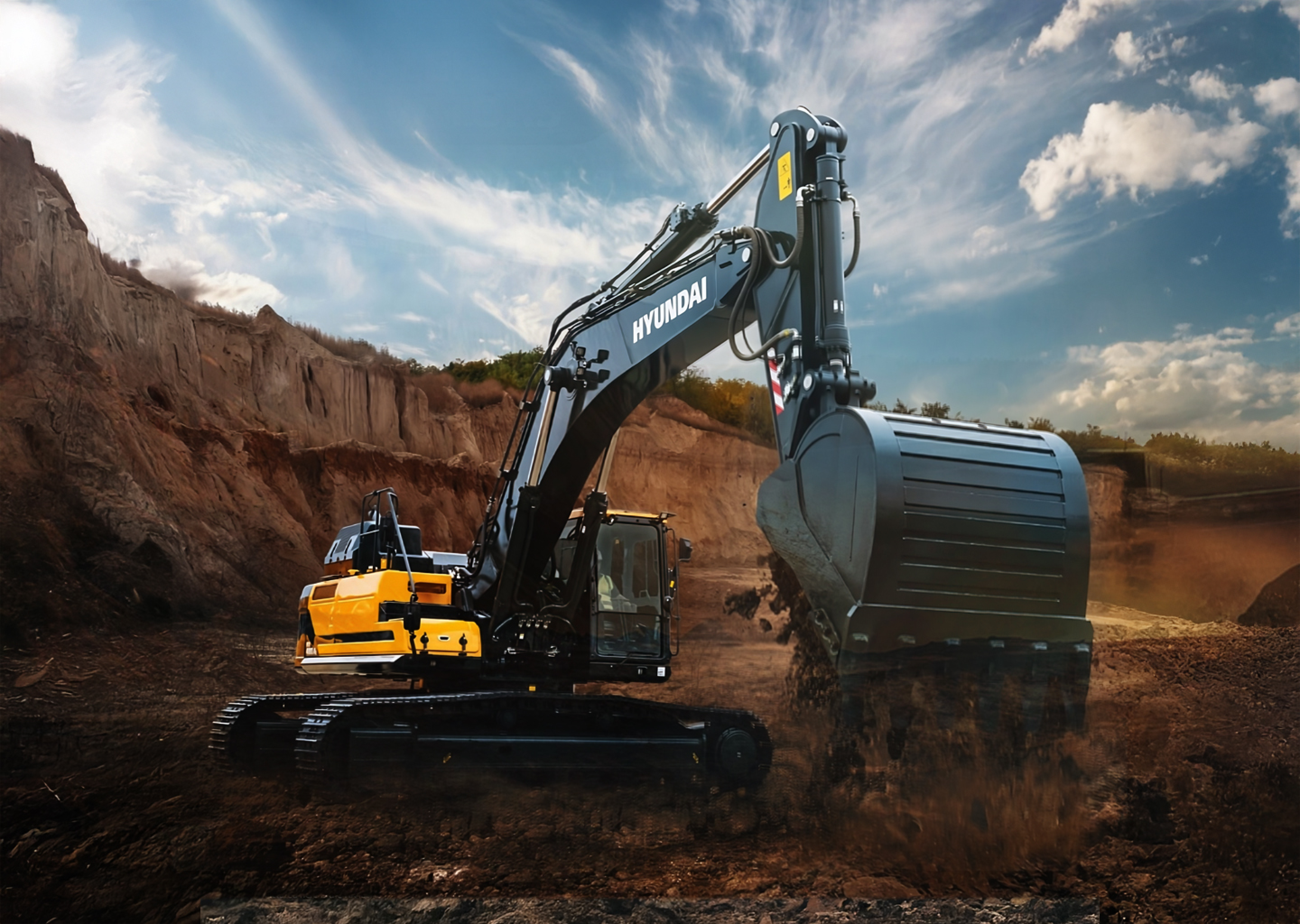 Yellow excavator on construction site